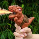 Mini Dinosaur Dino Machine Gun Toy with Spray Smoke Effect